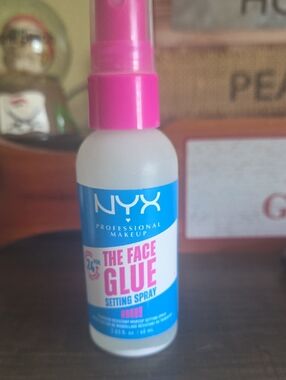 NYX The Face Glue Setting Spray — Pink Cap & Blue Label